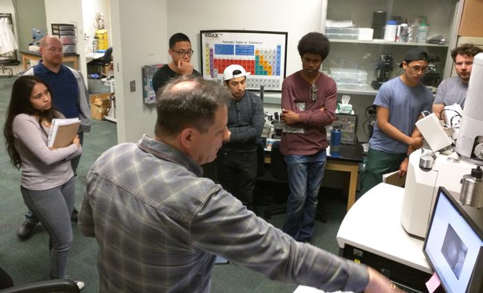 Nanotech students from West LA College visiting USC-CEMMA. Looking at samples on the JEOL SEM.